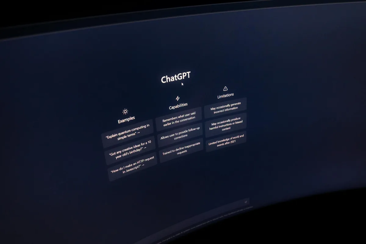 ChatGPT interface showing Capabilities, Examples, and Limitations sections on a dark background display